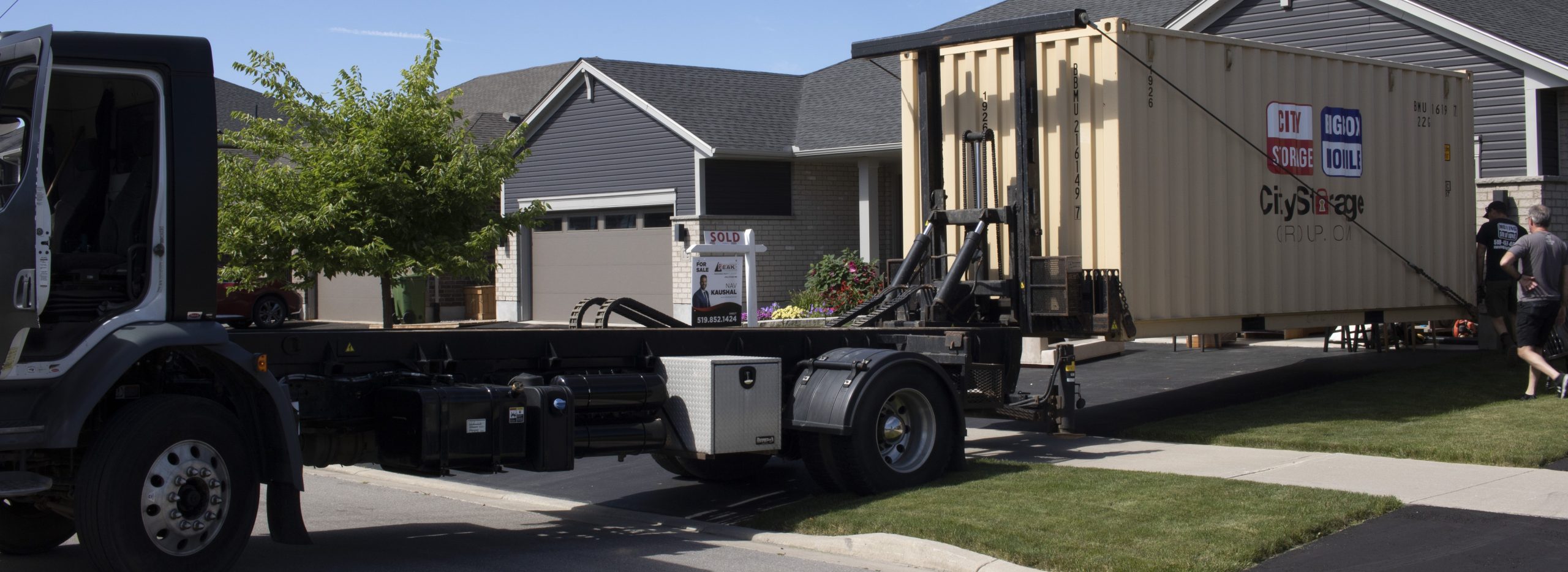 big mox mobile storage unit delivered to driveway for simple moving solution